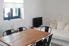 The dining room with the other sofa